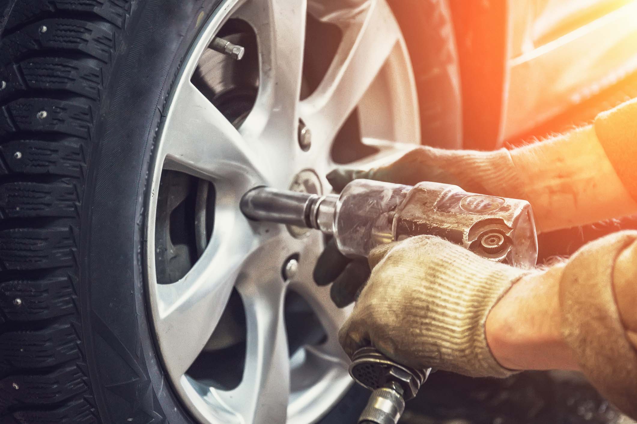 dreamstime_m_103779613 Automotive suspension test and brake test rolls in a auto repair service. Background